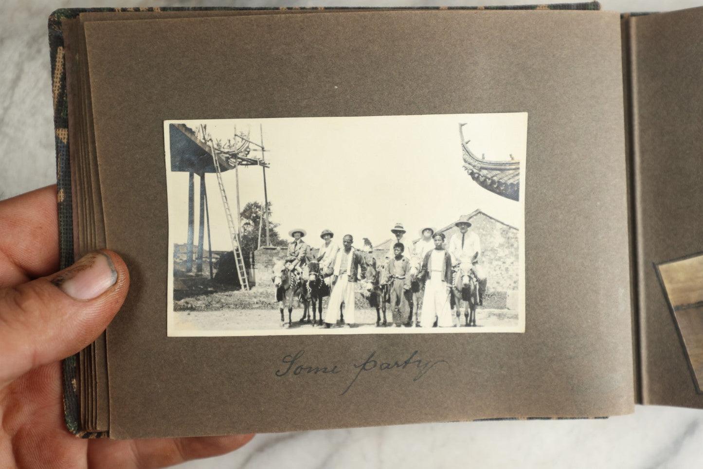 Lot 113 - Antique Snapshot Photo Album With Cloth Cover, Containing Approximately 75 Photographs With Captions, Mostly Of Travel, Including To Sea Travel, Locations In Asia, Sail Boats In Suez Canal, Singapore, Hong Kong, And More, Circa 1920s