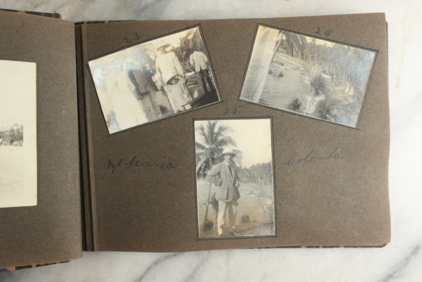 Lot 113 - Antique Snapshot Photo Album With Cloth Cover, Containing Approximately 75 Photographs With Captions, Mostly Of Travel, Including To Sea Travel, Locations In Asia, Sail Boats In Suez Canal, Singapore, Hong Kong, And More, Circa 1920s