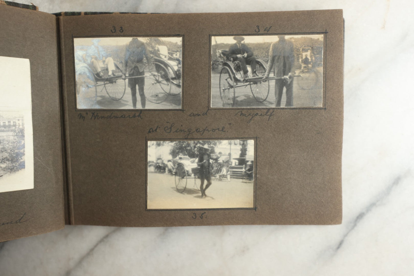 Lot 113 - Antique Snapshot Photo Album With Cloth Cover, Containing Approximately 75 Photographs With Captions, Mostly Of Travel, Including To Sea Travel, Locations In Asia, Sail Boats In Suez Canal, Singapore, Hong Kong, And More, Circa 1920s