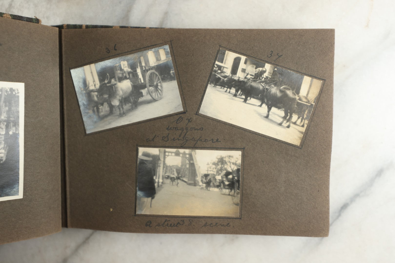 Lot 113 - Antique Snapshot Photo Album With Cloth Cover, Containing Approximately 75 Photographs With Captions, Mostly Of Travel, Including To Sea Travel, Locations In Asia, Sail Boats In Suez Canal, Singapore, Hong Kong, And More, Circa 1920s