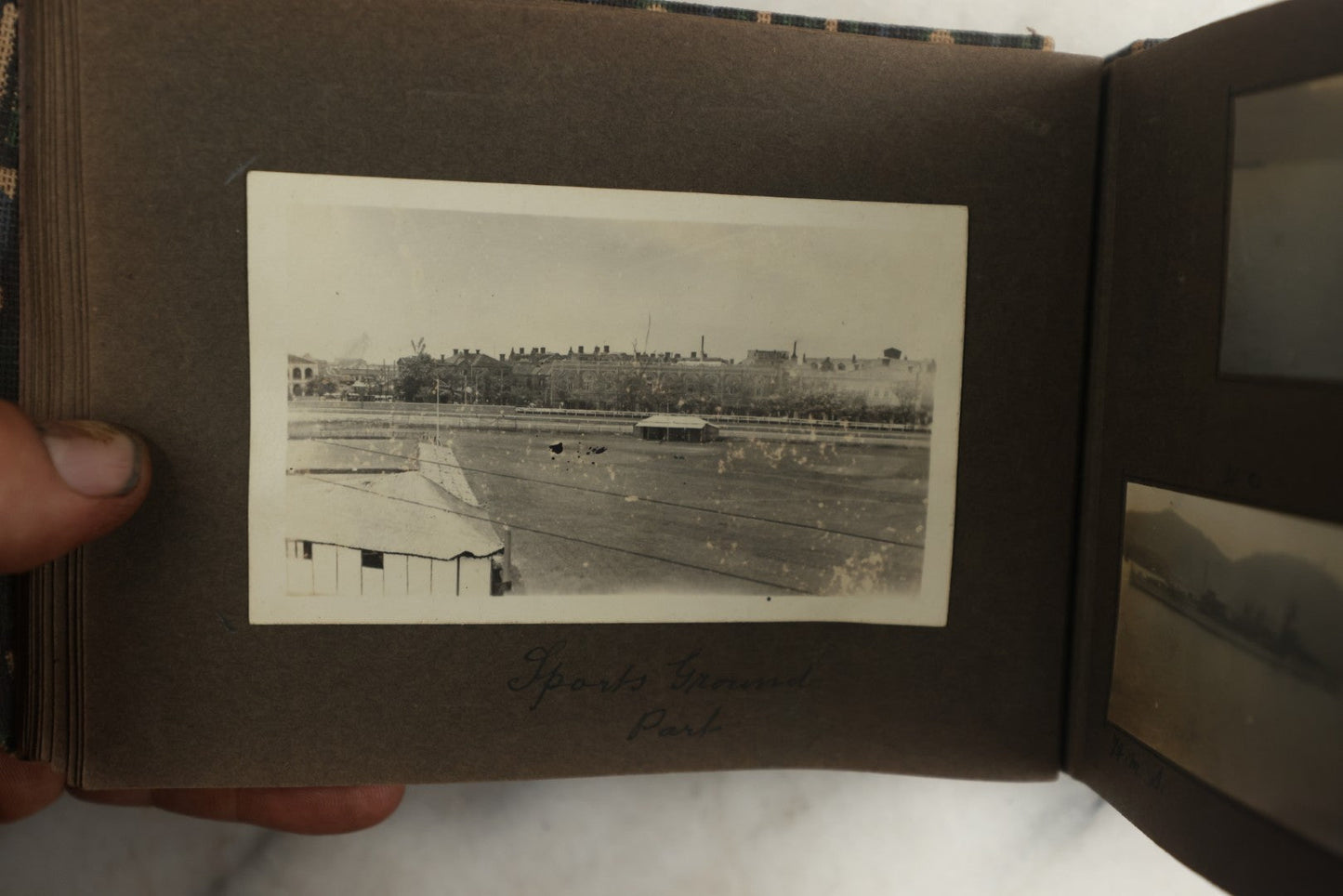 Lot 113 - Antique Snapshot Photo Album With Cloth Cover, Containing Approximately 75 Photographs With Captions, Mostly Of Travel, Including To Sea Travel, Locations In Asia, Sail Boats In Suez Canal, Singapore, Hong Kong, And More, Circa 1920s