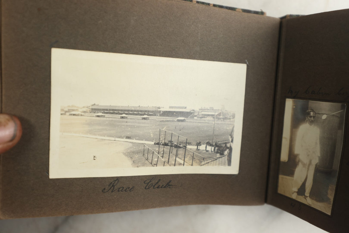 Lot 113 - Antique Snapshot Photo Album With Cloth Cover, Containing Approximately 75 Photographs With Captions, Mostly Of Travel, Including To Sea Travel, Locations In Asia, Sail Boats In Suez Canal, Singapore, Hong Kong, And More, Circa 1920s
