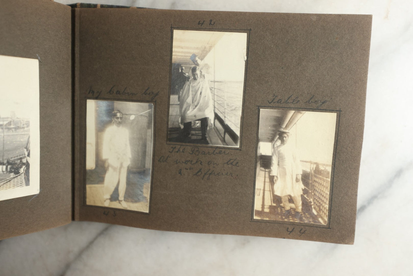 Lot 113 - Antique Snapshot Photo Album With Cloth Cover, Containing Approximately 75 Photographs With Captions, Mostly Of Travel, Including To Sea Travel, Locations In Asia, Sail Boats In Suez Canal, Singapore, Hong Kong, And More, Circa 1920s