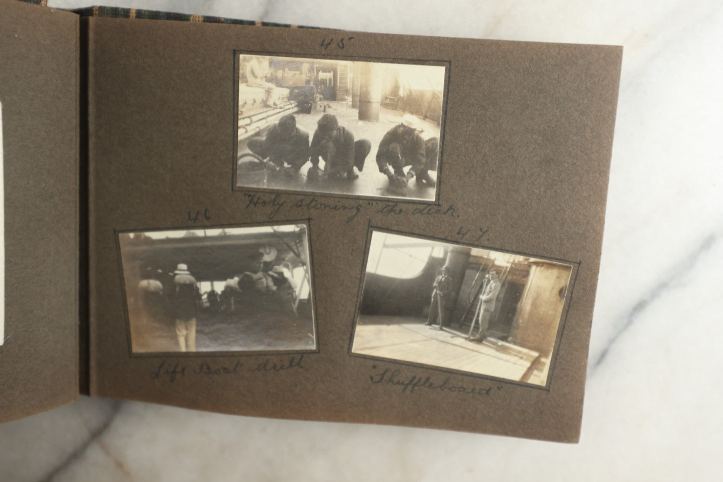 Lot 113 - Antique Snapshot Photo Album With Cloth Cover, Containing Approximately 75 Photographs With Captions, Mostly Of Travel, Including To Sea Travel, Locations In Asia, Sail Boats In Suez Canal, Singapore, Hong Kong, And More, Circa 1920s