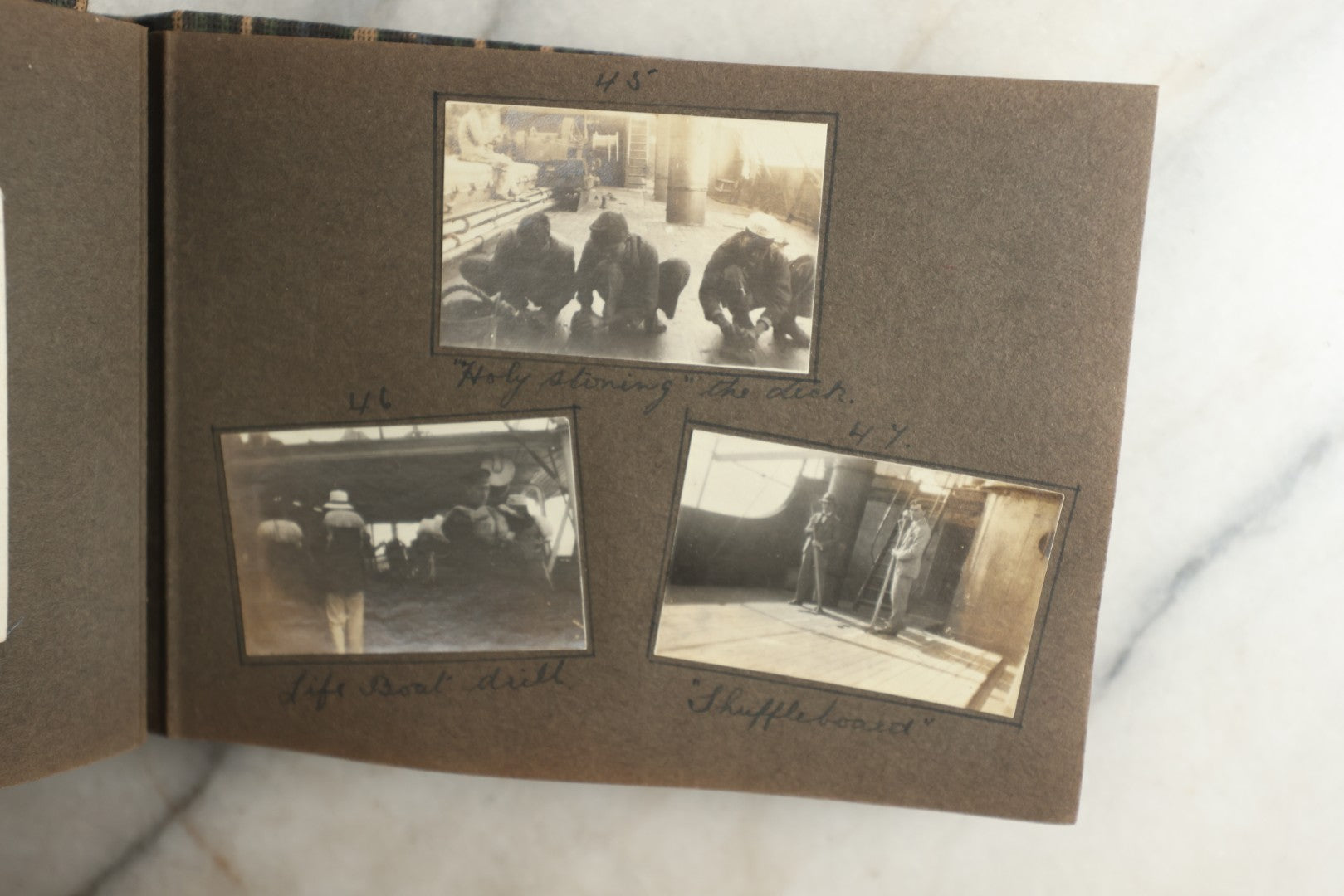 Lot 113 - Antique Snapshot Photo Album With Cloth Cover, Containing Approximately 75 Photographs With Captions, Mostly Of Travel, Including To Sea Travel, Locations In Asia, Sail Boats In Suez Canal, Singapore, Hong Kong, And More, Circa 1920s