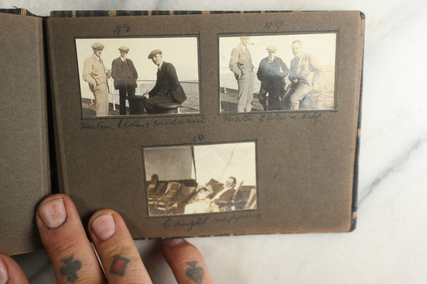 Lot 113 - Antique Snapshot Photo Album With Cloth Cover, Containing Approximately 75 Photographs With Captions, Mostly Of Travel, Including To Sea Travel, Locations In Asia, Sail Boats In Suez Canal, Singapore, Hong Kong, And More, Circa 1920s