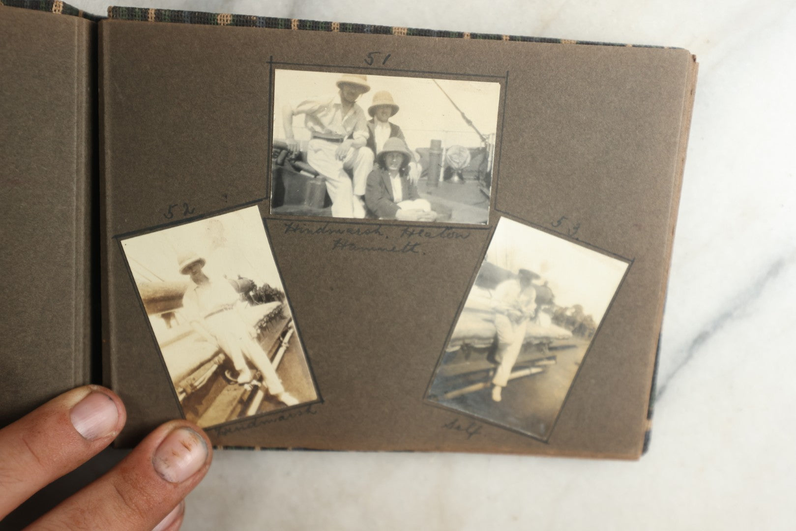 Lot 113 - Antique Snapshot Photo Album With Cloth Cover, Containing Approximately 75 Photographs With Captions, Mostly Of Travel, Including To Sea Travel, Locations In Asia, Sail Boats In Suez Canal, Singapore, Hong Kong, And More, Circa 1920s