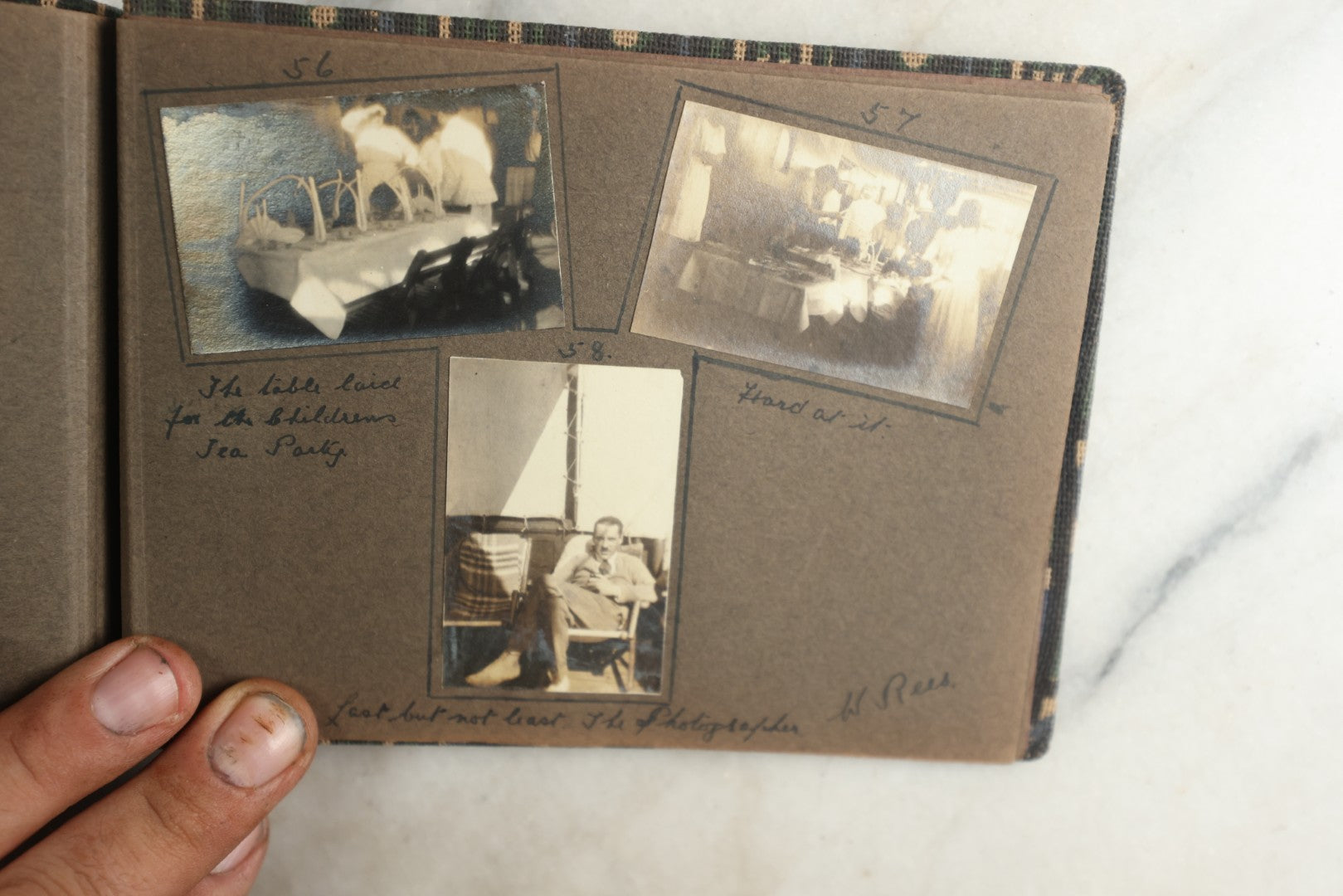 Lot 113 - Antique Snapshot Photo Album With Cloth Cover, Containing Approximately 75 Photographs With Captions, Mostly Of Travel, Including To Sea Travel, Locations In Asia, Sail Boats In Suez Canal, Singapore, Hong Kong, And More, Circa 1920s