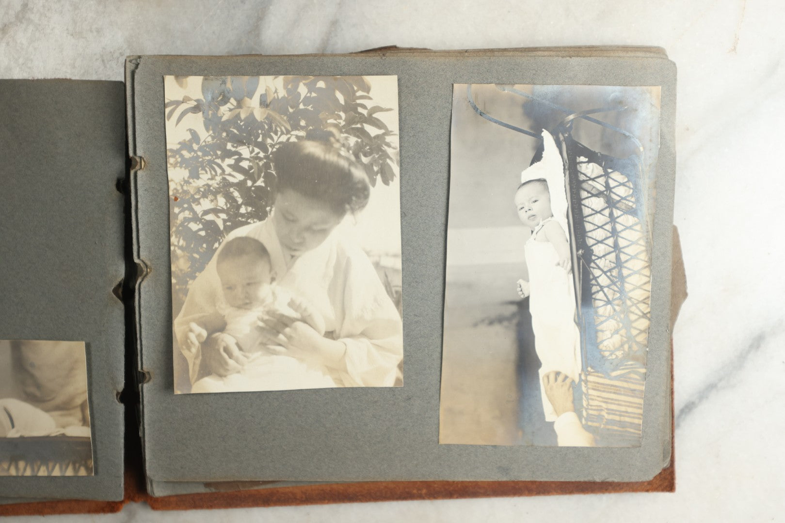 Lot 114 - Antique Snapshot Photo Album With Leather Southwestern Cover, Containing Approximately 50 Photographs With Captions, Mostly Of Travel, Including To Japan, Asia, Photo Of Ship Captain, And More, Circa 1905