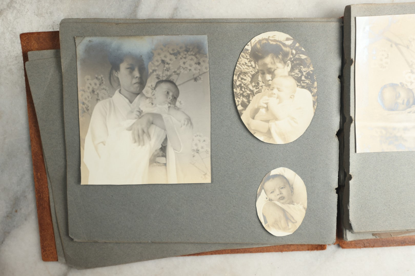 Lot 114 - Antique Snapshot Photo Album With Leather Southwestern Cover, Containing Approximately 50 Photographs With Captions, Mostly Of Travel, Including To Japan, Asia, Photo Of Ship Captain, And More, Circa 1905