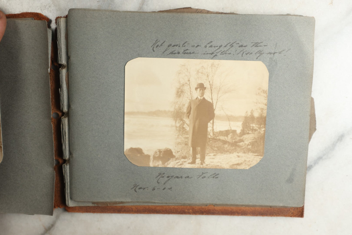 Lot 114 - Antique Snapshot Photo Album With Leather Southwestern Cover, Containing Approximately 50 Photographs With Captions, Mostly Of Travel, Including To Japan, Asia, Photo Of Ship Captain, And More, Circa 1905