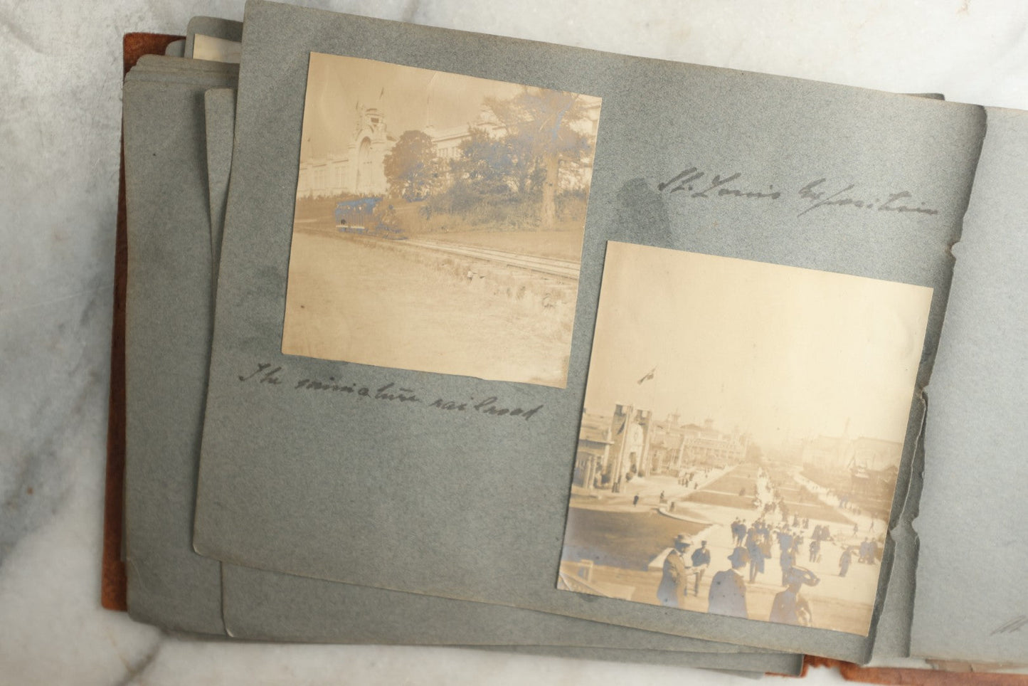 Lot 114 - Antique Snapshot Photo Album With Leather Southwestern Cover, Containing Approximately 50 Photographs With Captions, Mostly Of Travel, Including To Japan, Asia, Photo Of Ship Captain, And More, Circa 1905