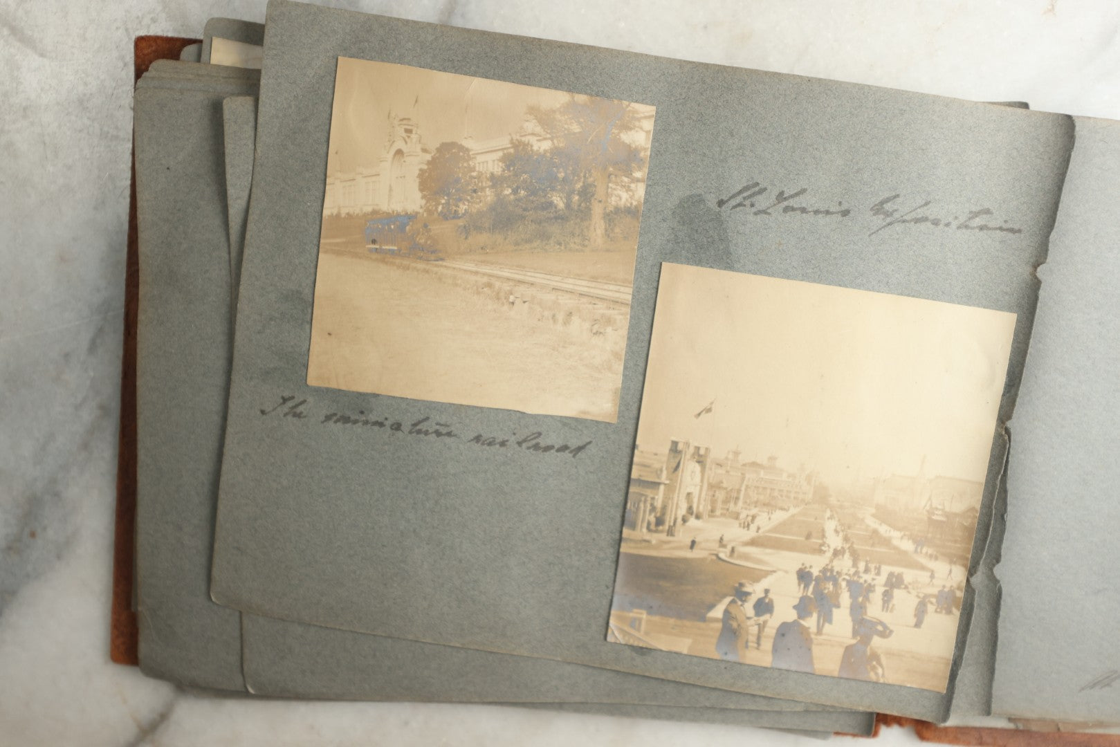 Lot 114 - Antique Snapshot Photo Album With Leather Southwestern Cover, Containing Approximately 50 Photographs With Captions, Mostly Of Travel, Including To Japan, Asia, Photo Of Ship Captain, And More, Circa 1905
