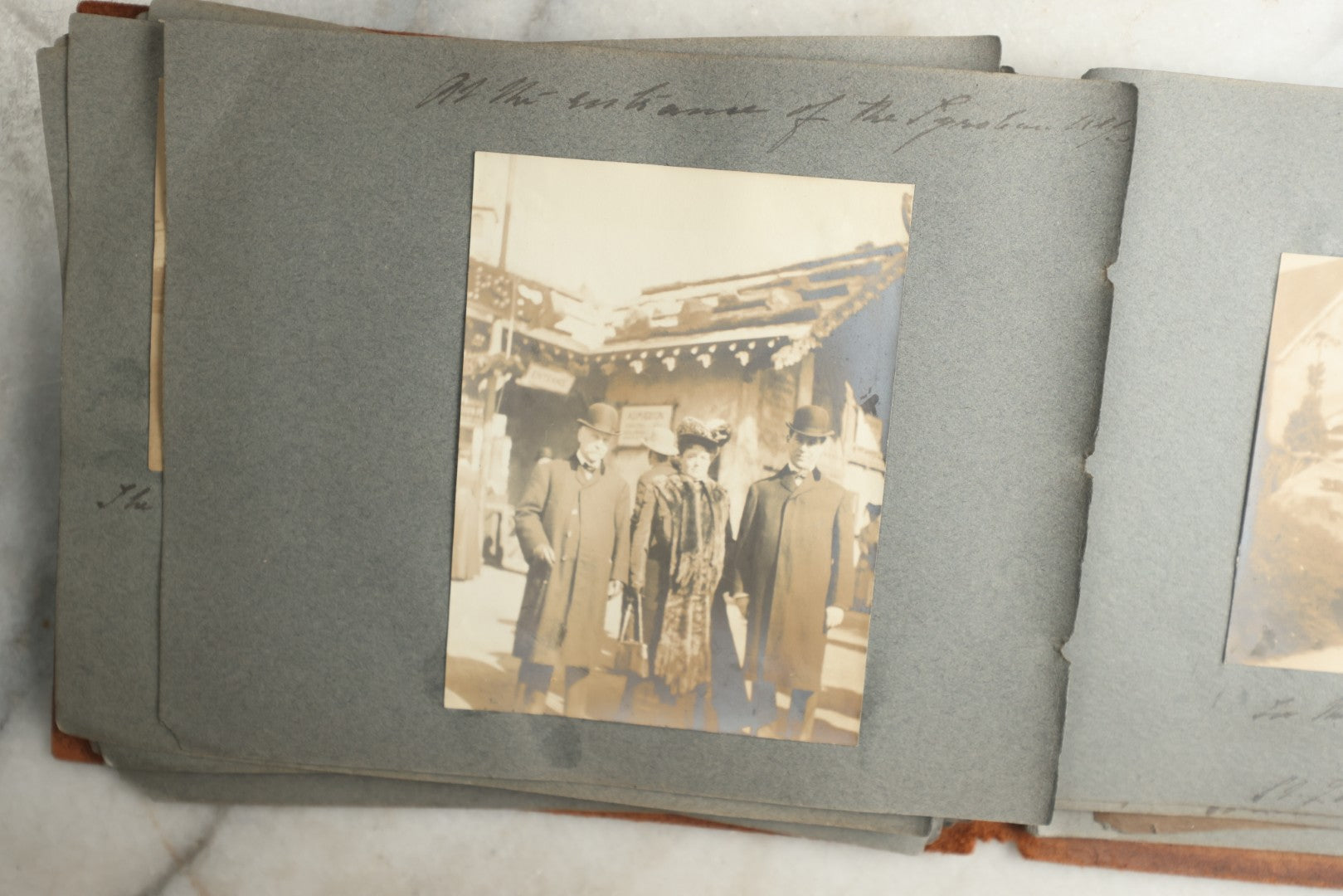 Lot 114 - Antique Snapshot Photo Album With Leather Southwestern Cover, Containing Approximately 50 Photographs With Captions, Mostly Of Travel, Including To Japan, Asia, Photo Of Ship Captain, And More, Circa 1905