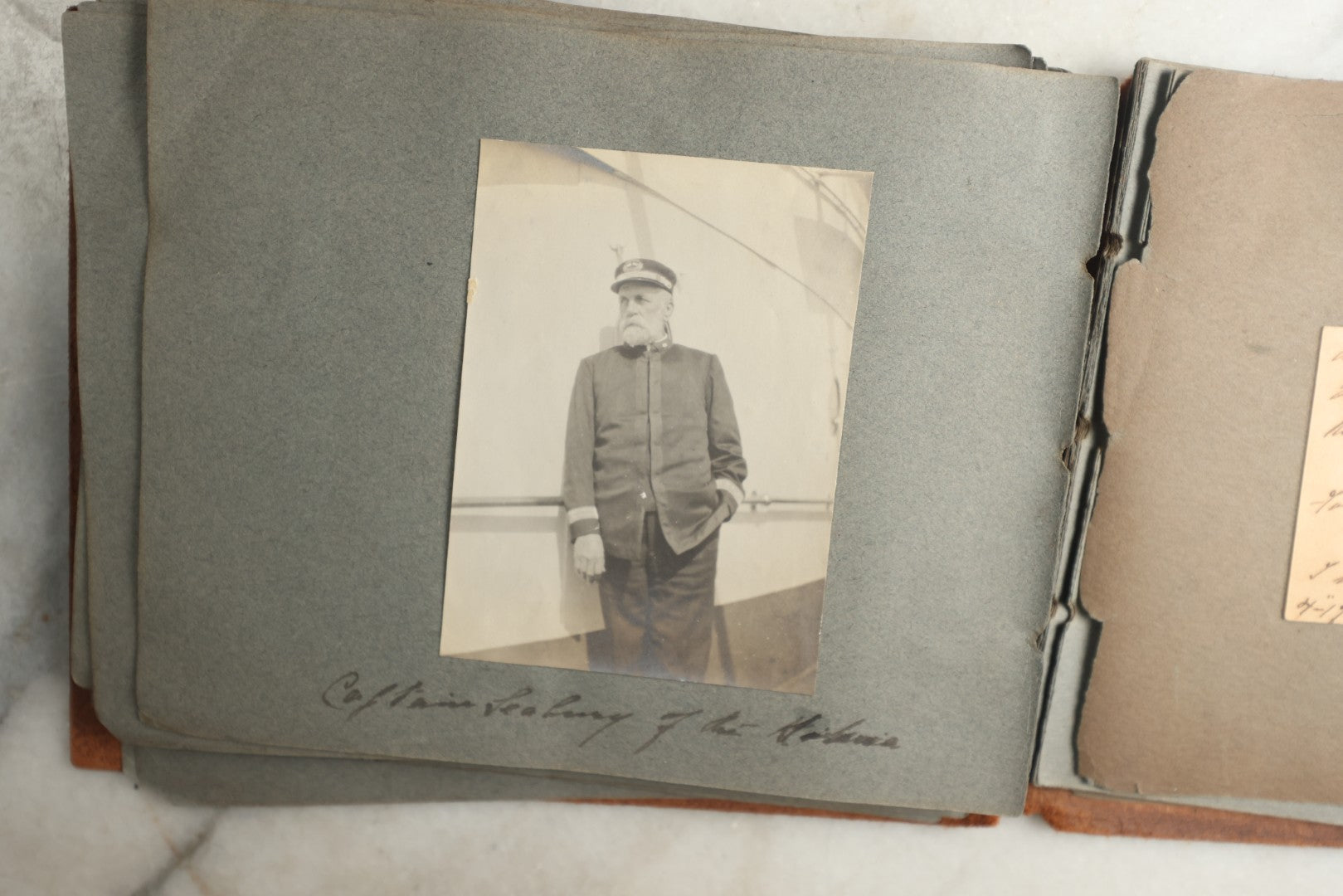 Lot 114 - Antique Snapshot Photo Album With Leather Southwestern Cover, Containing Approximately 50 Photographs With Captions, Mostly Of Travel, Including To Japan, Asia, Photo Of Ship Captain, And More, Circa 1905