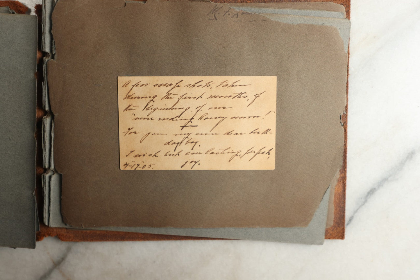 Lot 114 - Antique Snapshot Photo Album With Leather Southwestern Cover, Containing Approximately 50 Photographs With Captions, Mostly Of Travel, Including To Japan, Asia, Photo Of Ship Captain, And More, Circa 1905
