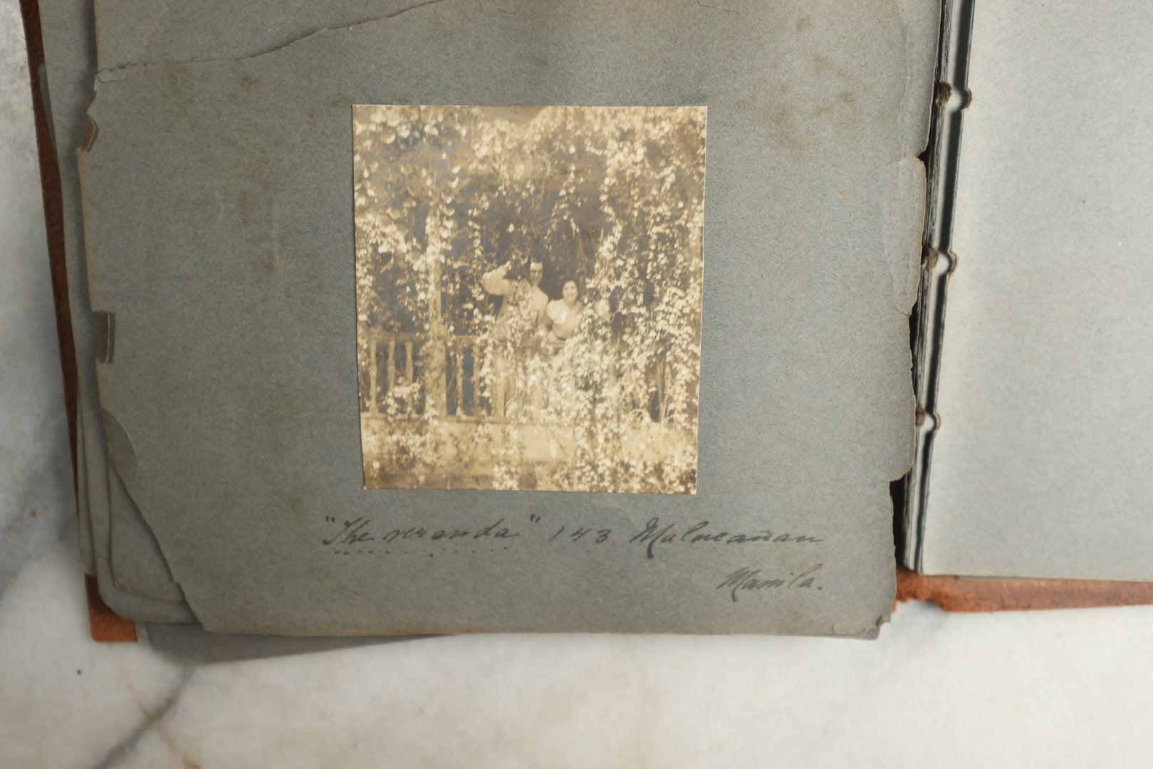 Lot 114 - Antique Snapshot Photo Album With Leather Southwestern Cover, Containing Approximately 50 Photographs With Captions, Mostly Of Travel, Including To Japan, Asia, Photo Of Ship Captain, And More, Circa 1905