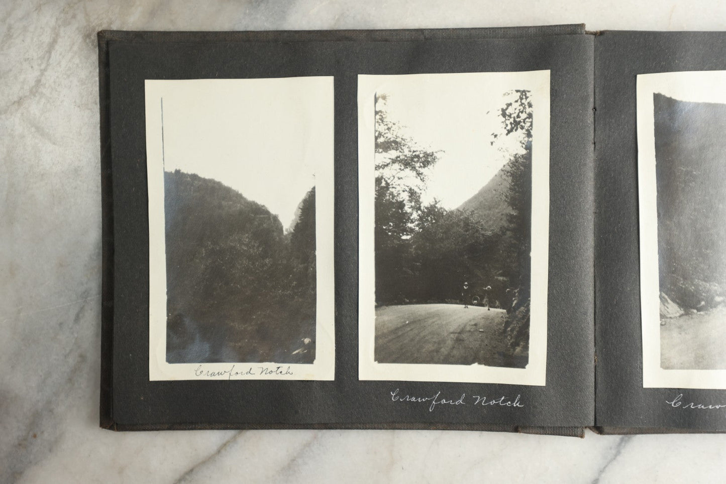 Lot 115 - Antique Snapshot Photo Album With Leather Containing Approximately 75 Photographs With Captions, Mostly Around New Hampshire, White Mountains, Whitehouse Beach, Photos Of People In Early Swimwear, Camping, Lighthouse, And More, Circa 1925