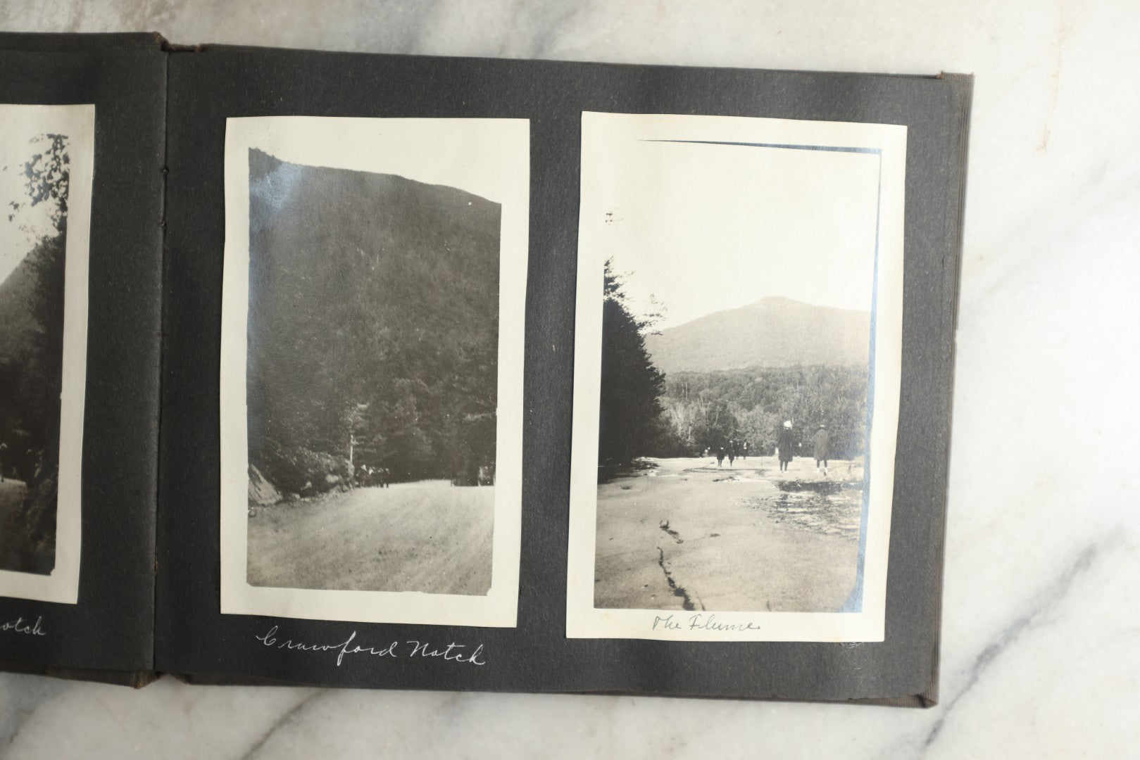 Lot 115 - Antique Snapshot Photo Album With Leather Containing Approximately 75 Photographs With Captions, Mostly Around New Hampshire, White Mountains, Whitehouse Beach, Photos Of People In Early Swimwear, Camping, Lighthouse, And More, Circa 1925