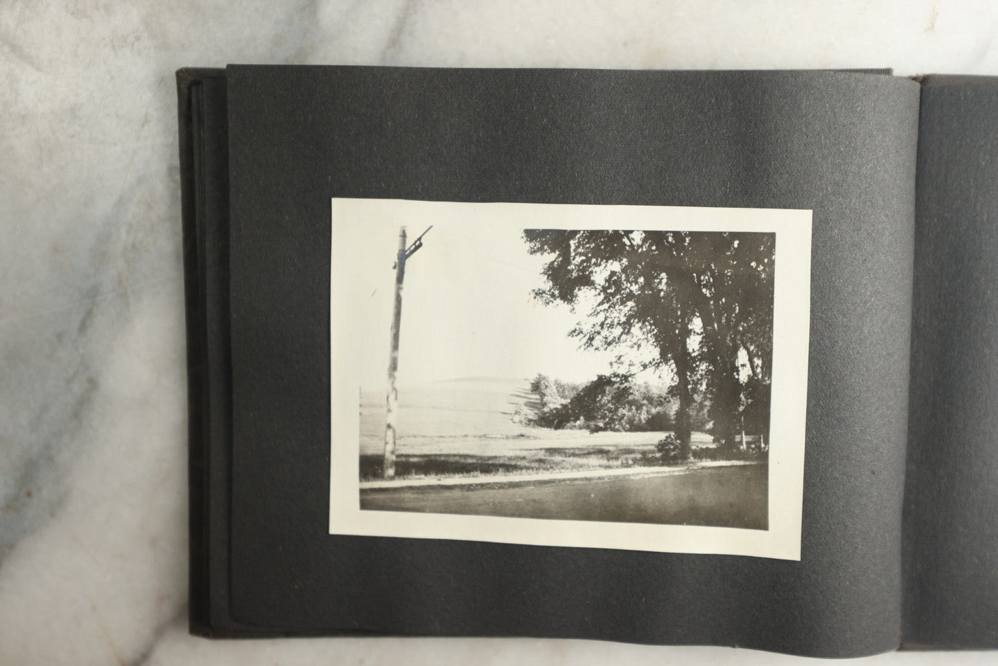 Lot 115 - Antique Snapshot Photo Album With Leather Containing Approximately 75 Photographs With Captions, Mostly Around New Hampshire, White Mountains, Whitehouse Beach, Photos Of People In Early Swimwear, Camping, Lighthouse, And More, Circa 1925