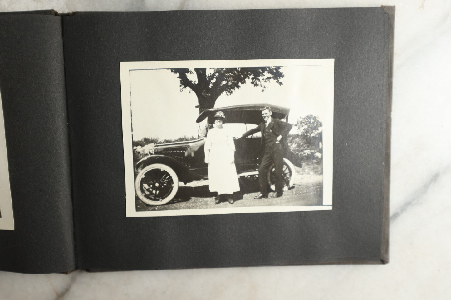 Lot 115 - Antique Snapshot Photo Album With Leather Containing Approximately 75 Photographs With Captions, Mostly Around New Hampshire, White Mountains, Whitehouse Beach, Photos Of People In Early Swimwear, Camping, Lighthouse, And More, Circa 1925