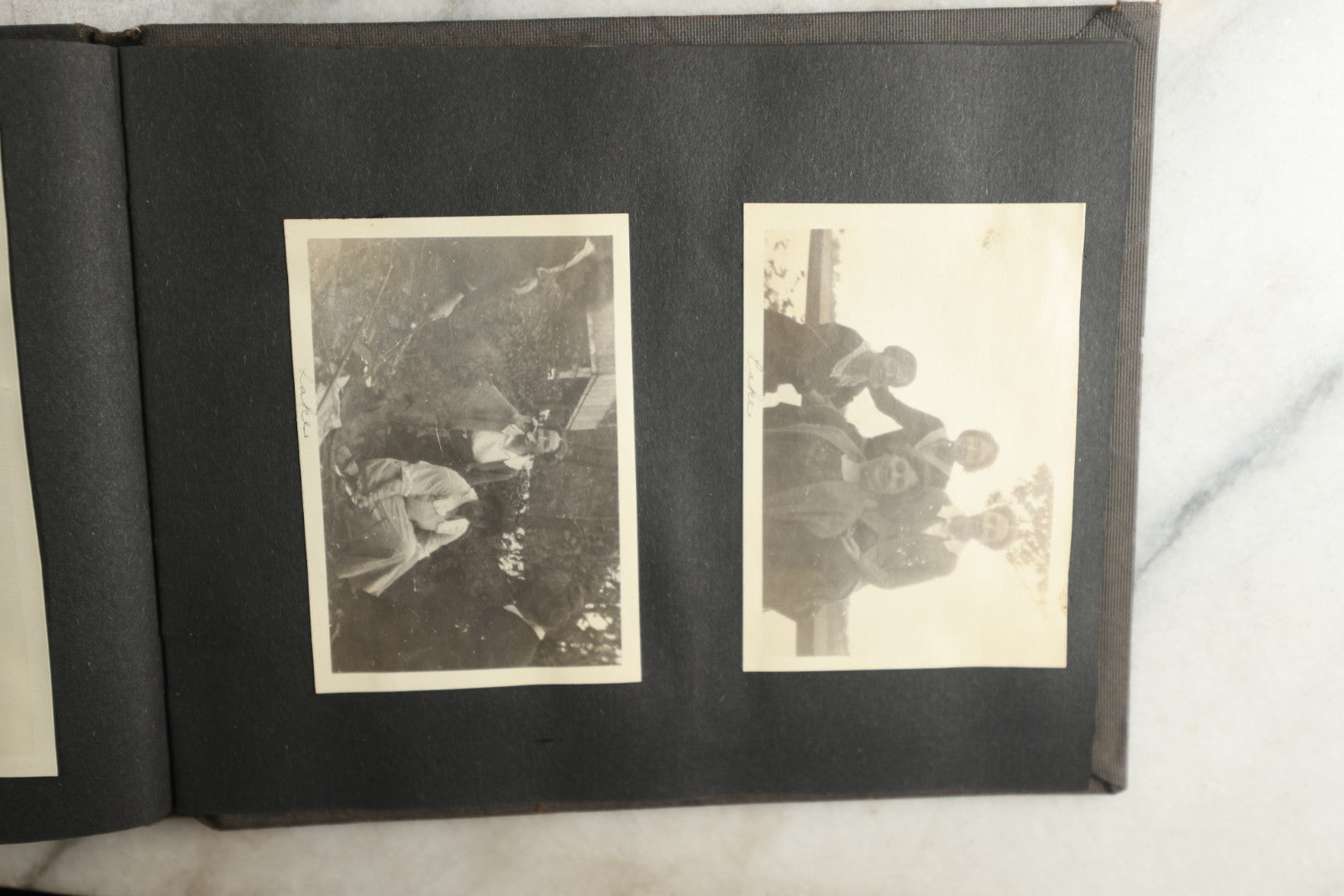 Lot 115 - Antique Snapshot Photo Album With Leather Containing Approximately 75 Photographs With Captions, Mostly Around New Hampshire, White Mountains, Whitehouse Beach, Photos Of People In Early Swimwear, Camping, Lighthouse, And More, Circa 1925