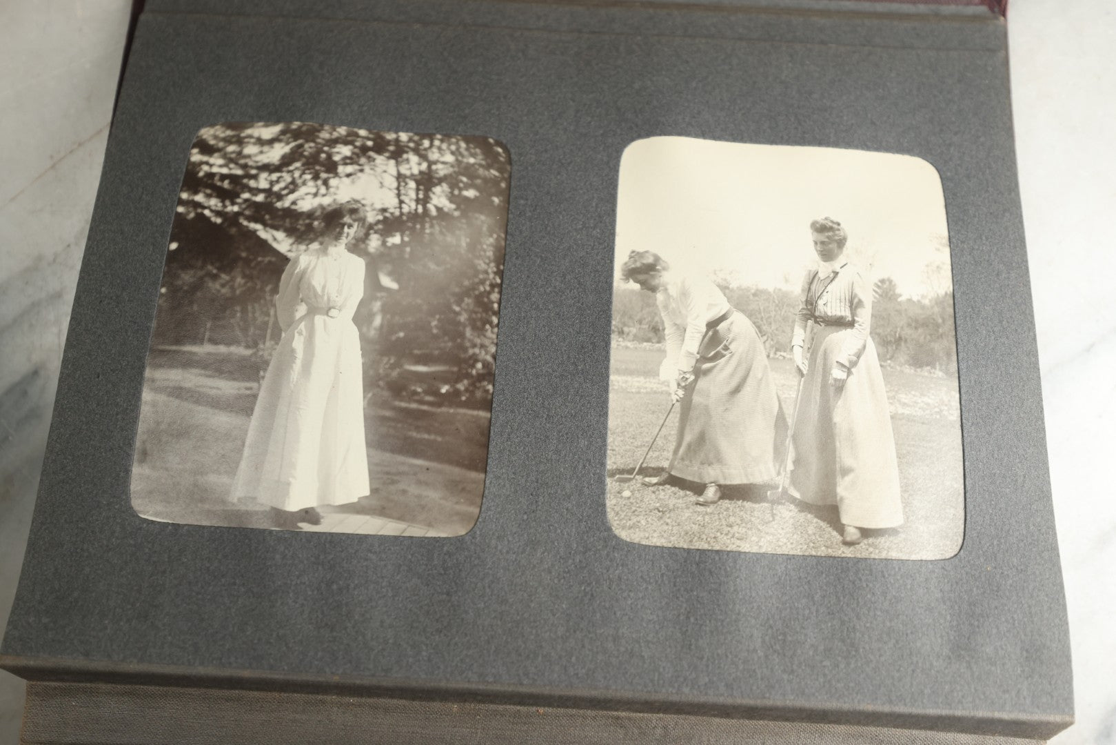 Lot 116 - Antique Snapshot Photo Album, Containing Approximately 100 Photographs, Including Ladies Golfing, Leisure Time Outdoors, Wedding Photos, Ice Skating And Hockey, Dogs, And More, Circa 1905