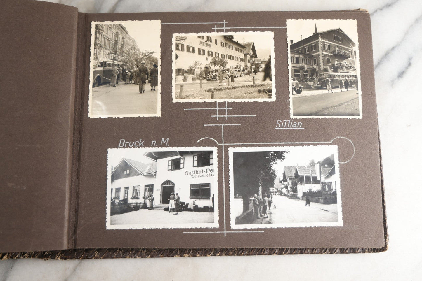 Lot 122 - Antique Snapshot Photo Album, Containing Approximately 100 Photographs With Captions In Czech, Detailed Pin Striping And Painting On Pages, Mostly Photos Of Travel Around Europe, Including Italy, The Alps, Croatia, Ukraine, And More, Circa 1920