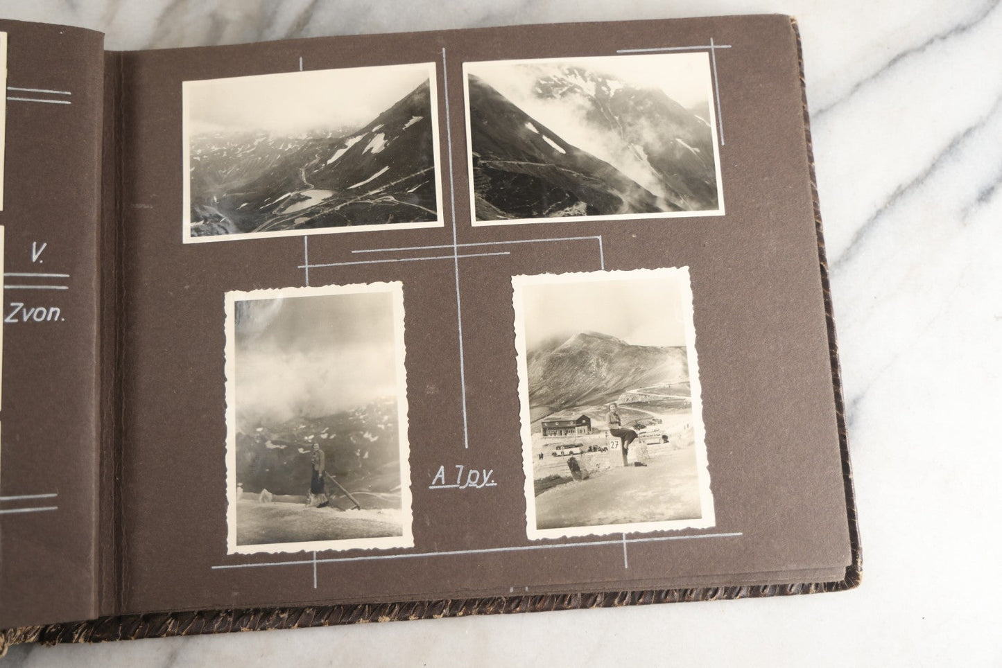 Lot 122 - Antique Snapshot Photo Album, Containing Approximately 100 Photographs With Captions In Czech, Detailed Pin Striping And Painting On Pages, Mostly Photos Of Travel Around Europe, Including Italy, The Alps, Croatia, Ukraine, And More, Circa 1920