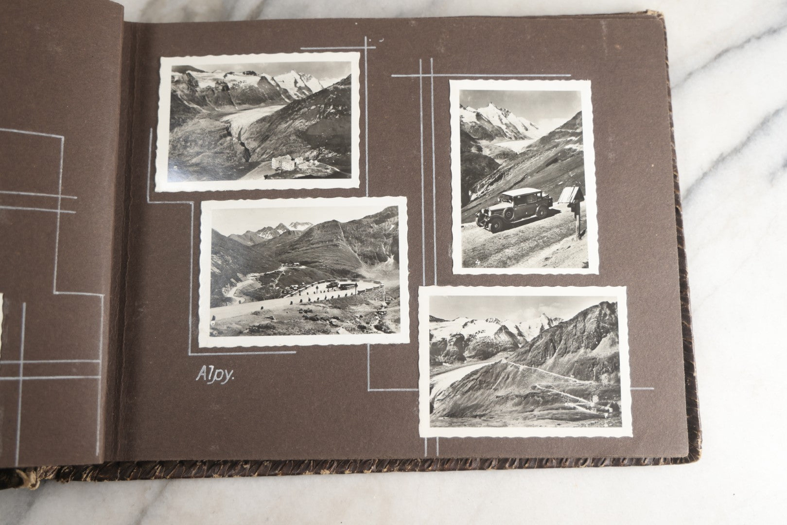 Lot 122 - Antique Snapshot Photo Album, Containing Approximately 100 Photographs With Captions In Czech, Detailed Pin Striping And Painting On Pages, Mostly Photos Of Travel Around Europe, Including Italy, The Alps, Croatia, Ukraine, And More, Circa 1920
