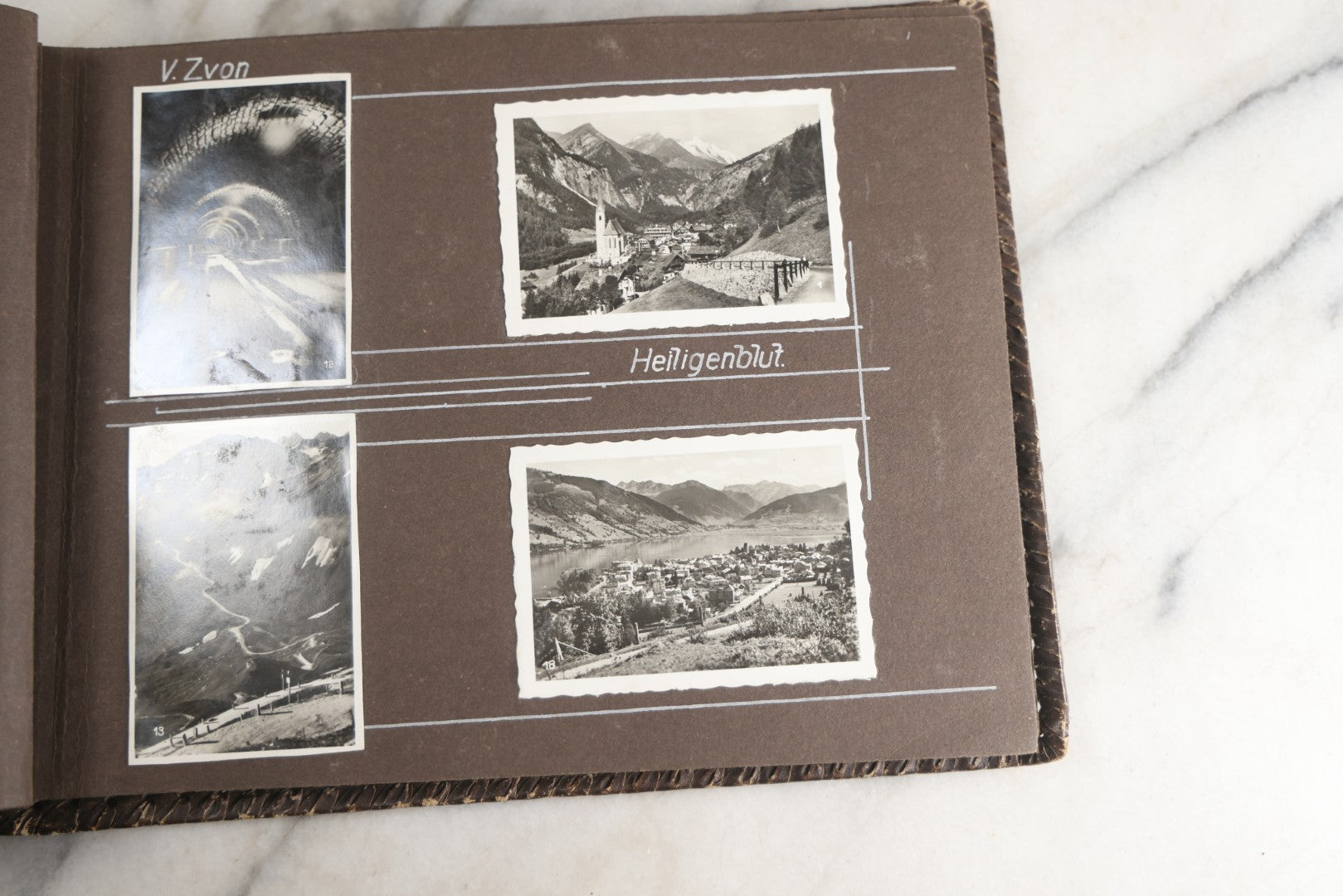 Lot 122 - Antique Snapshot Photo Album, Containing Approximately 100 Photographs With Captions In Czech, Detailed Pin Striping And Painting On Pages, Mostly Photos Of Travel Around Europe, Including Italy, The Alps, Croatia, Ukraine, And More, Circa 1920