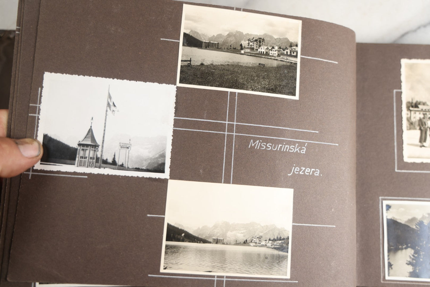 Lot 122 - Antique Snapshot Photo Album, Containing Approximately 100 Photographs With Captions In Czech, Detailed Pin Striping And Painting On Pages, Mostly Photos Of Travel Around Europe, Including Italy, The Alps, Croatia, Ukraine, And More, Circa 1920