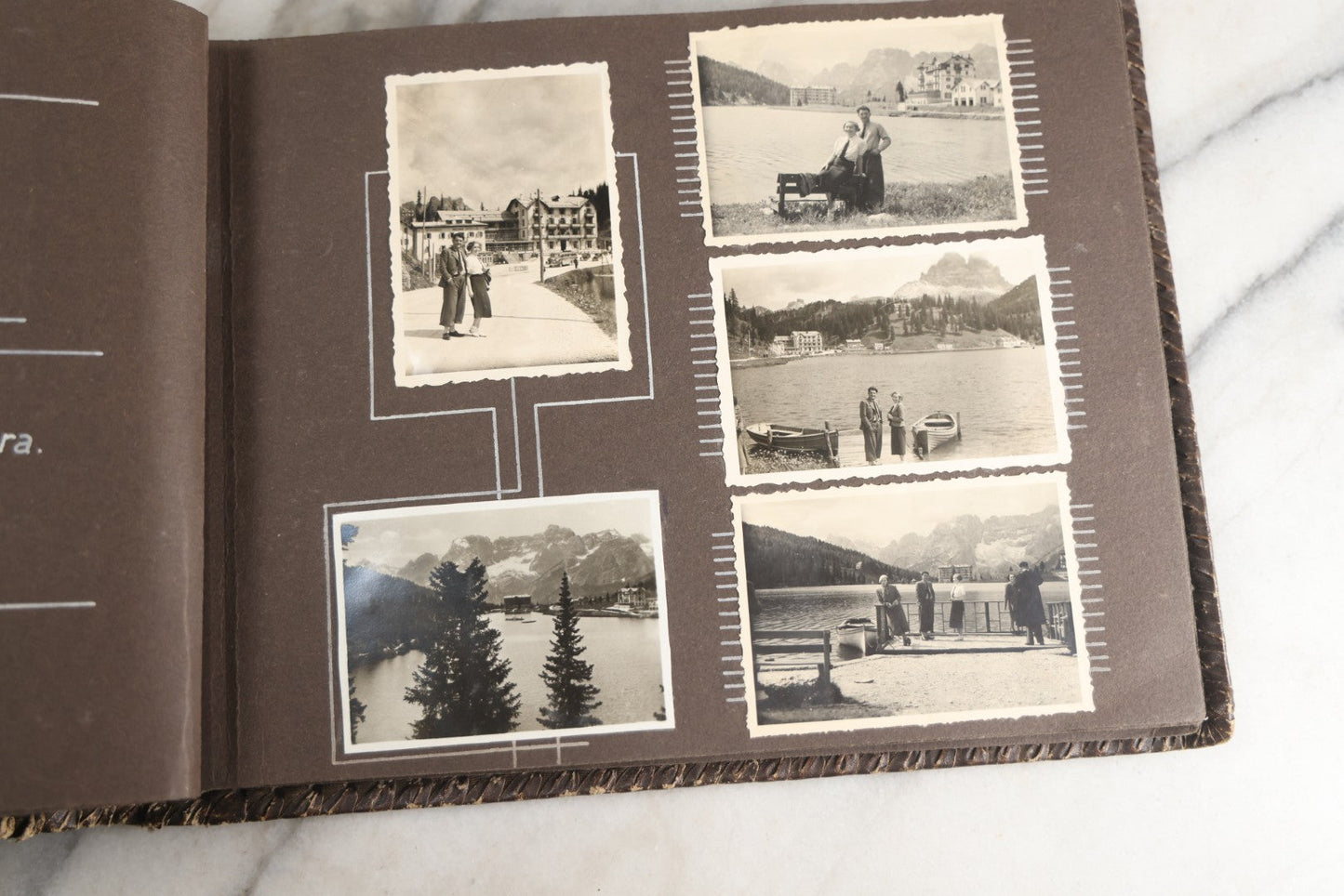 Lot 122 - Antique Snapshot Photo Album, Containing Approximately 100 Photographs With Captions In Czech, Detailed Pin Striping And Painting On Pages, Mostly Photos Of Travel Around Europe, Including Italy, The Alps, Croatia, Ukraine, And More, Circa 1920