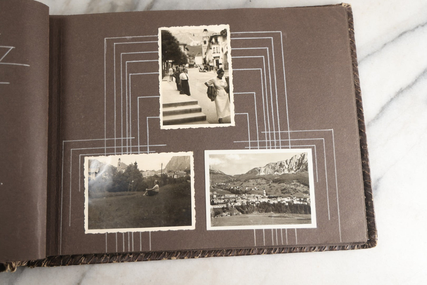 Lot 122 - Antique Snapshot Photo Album, Containing Approximately 100 Photographs With Captions In Czech, Detailed Pin Striping And Painting On Pages, Mostly Photos Of Travel Around Europe, Including Italy, The Alps, Croatia, Ukraine, And More, Circa 1920