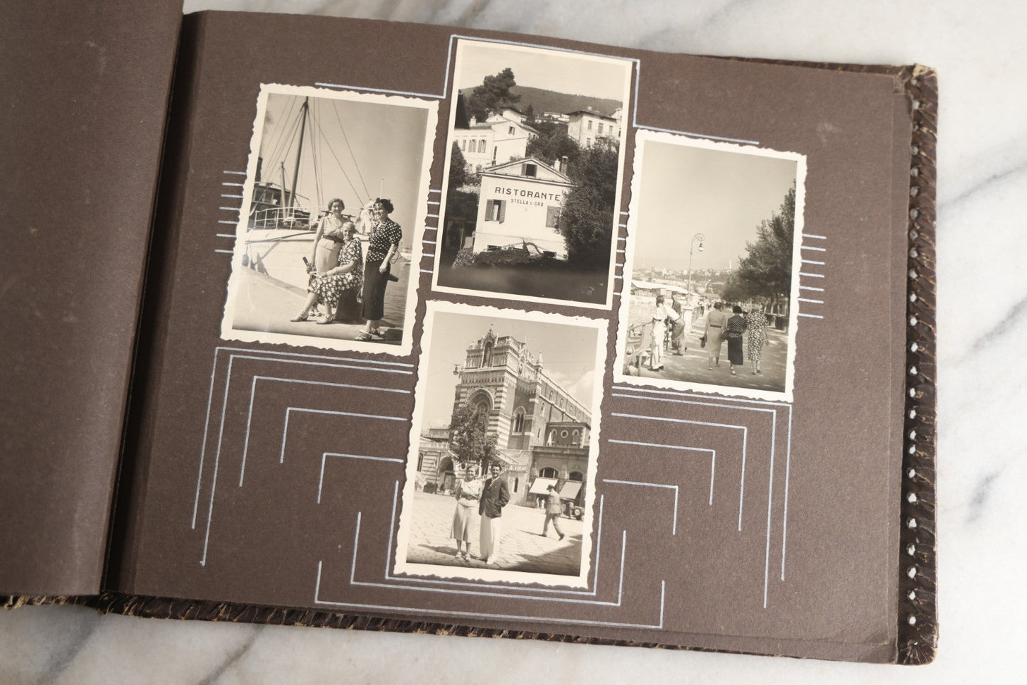 Lot 122 - Antique Snapshot Photo Album, Containing Approximately 100 Photographs With Captions In Czech, Detailed Pin Striping And Painting On Pages, Mostly Photos Of Travel Around Europe, Including Italy, The Alps, Croatia, Ukraine, And More, Circa 1920