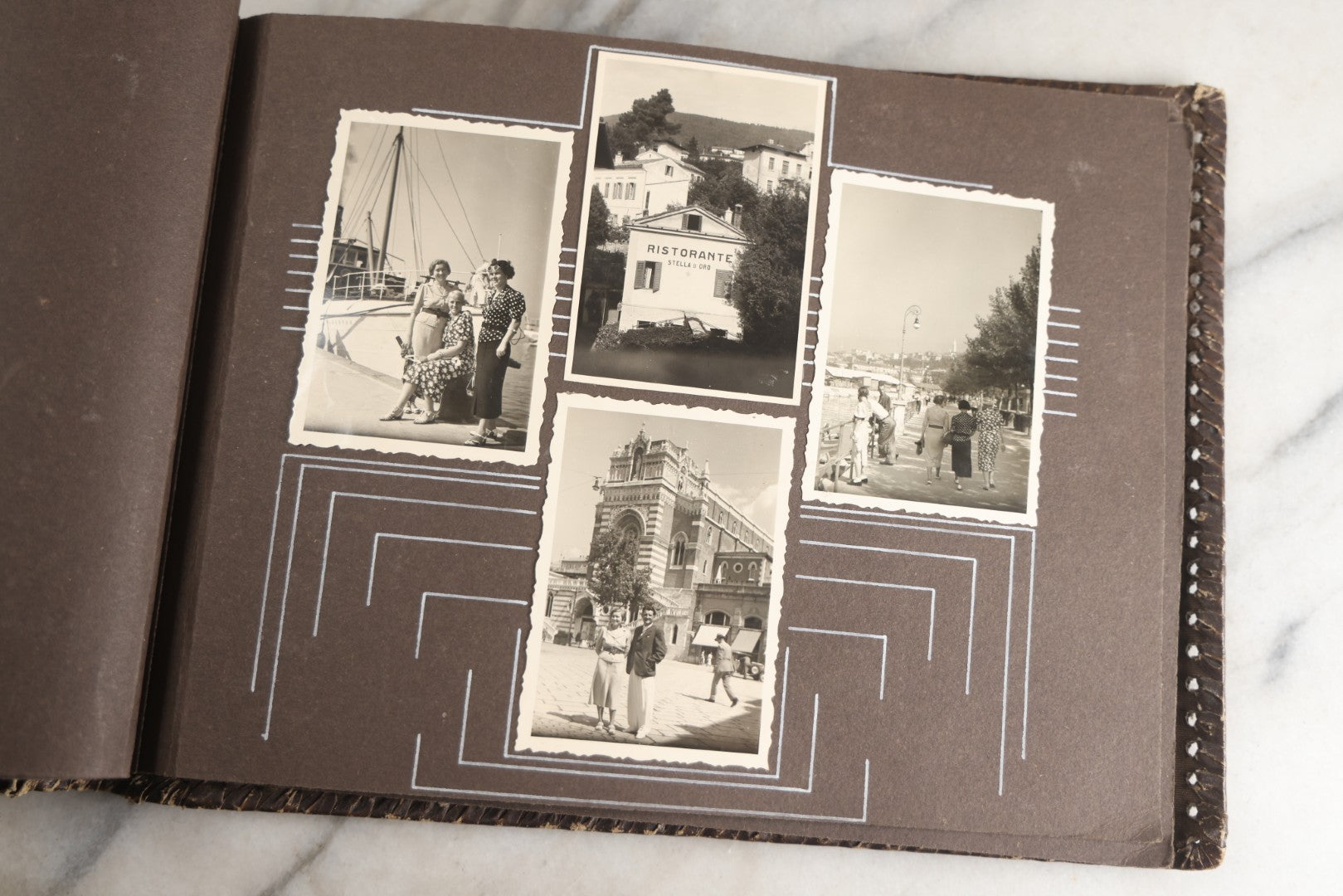 Lot 122 - Antique Snapshot Photo Album, Containing Approximately 100 Photographs With Captions In Czech, Detailed Pin Striping And Painting On Pages, Mostly Photos Of Travel Around Europe, Including Italy, The Alps, Croatia, Ukraine, And More, Circa 1920