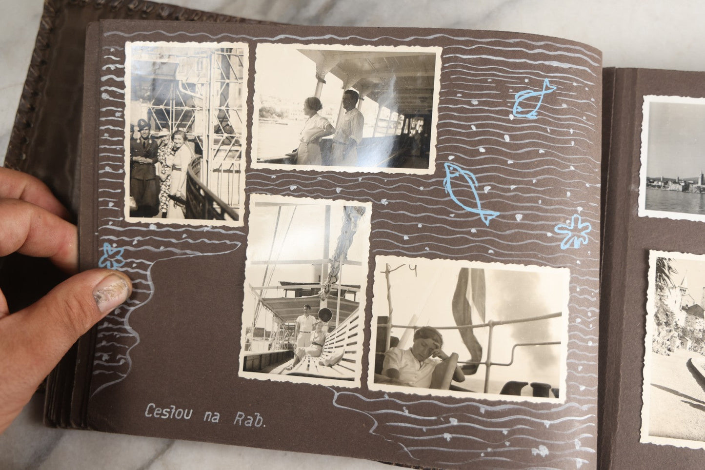 Lot 122 - Antique Snapshot Photo Album, Containing Approximately 100 Photographs With Captions In Czech, Detailed Pin Striping And Painting On Pages, Mostly Photos Of Travel Around Europe, Including Italy, The Alps, Croatia, Ukraine, And More, Circa 1920