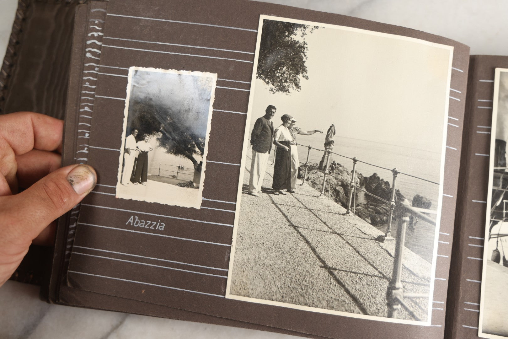 Lot 122 - Antique Snapshot Photo Album, Containing Approximately 100 Photographs With Captions In Czech, Detailed Pin Striping And Painting On Pages, Mostly Photos Of Travel Around Europe, Including Italy, The Alps, Croatia, Ukraine, And More, Circa 1920