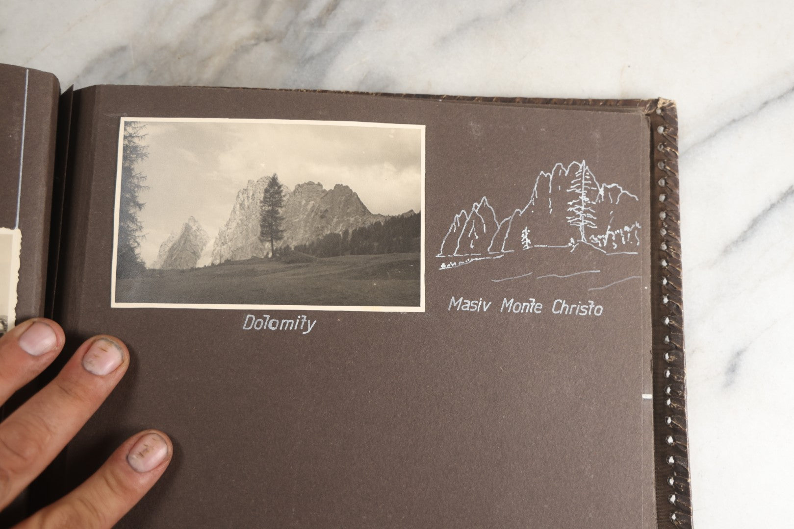 Lot 122 - Antique Snapshot Photo Album, Containing Approximately 100 Photographs With Captions In Czech, Detailed Pin Striping And Painting On Pages, Mostly Photos Of Travel Around Europe, Including Italy, The Alps, Croatia, Ukraine, And More, Circa 1920