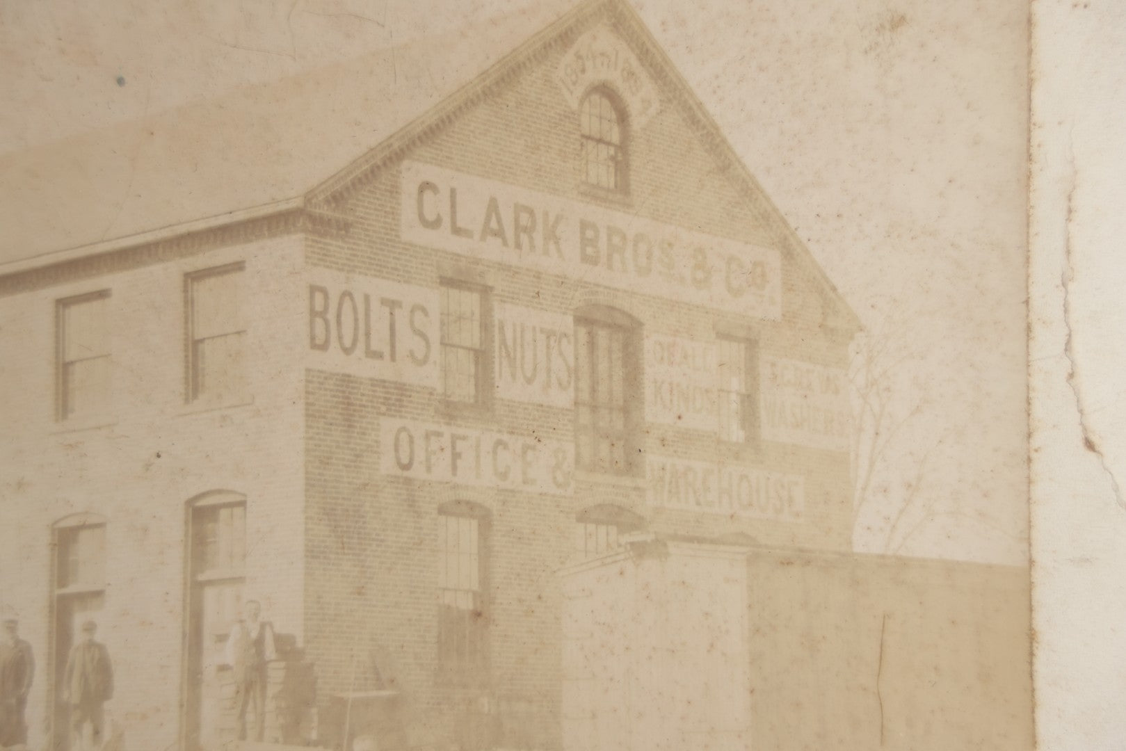 Lot 124 - Antique Boarded Occupational Photograph Of The Clarke Bros & Co. Bolts And Nuts Office And Warehouse Building With Train Car, Cattle, Horses, And Workers In Frame