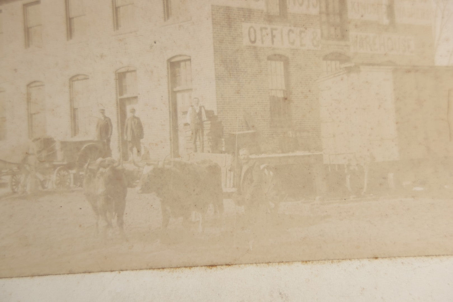 Lot 124 - Antique Boarded Occupational Photograph Of The Clarke Bros & Co. Bolts And Nuts Office And Warehouse Building With Train Car, Cattle, Horses, And Workers In Frame