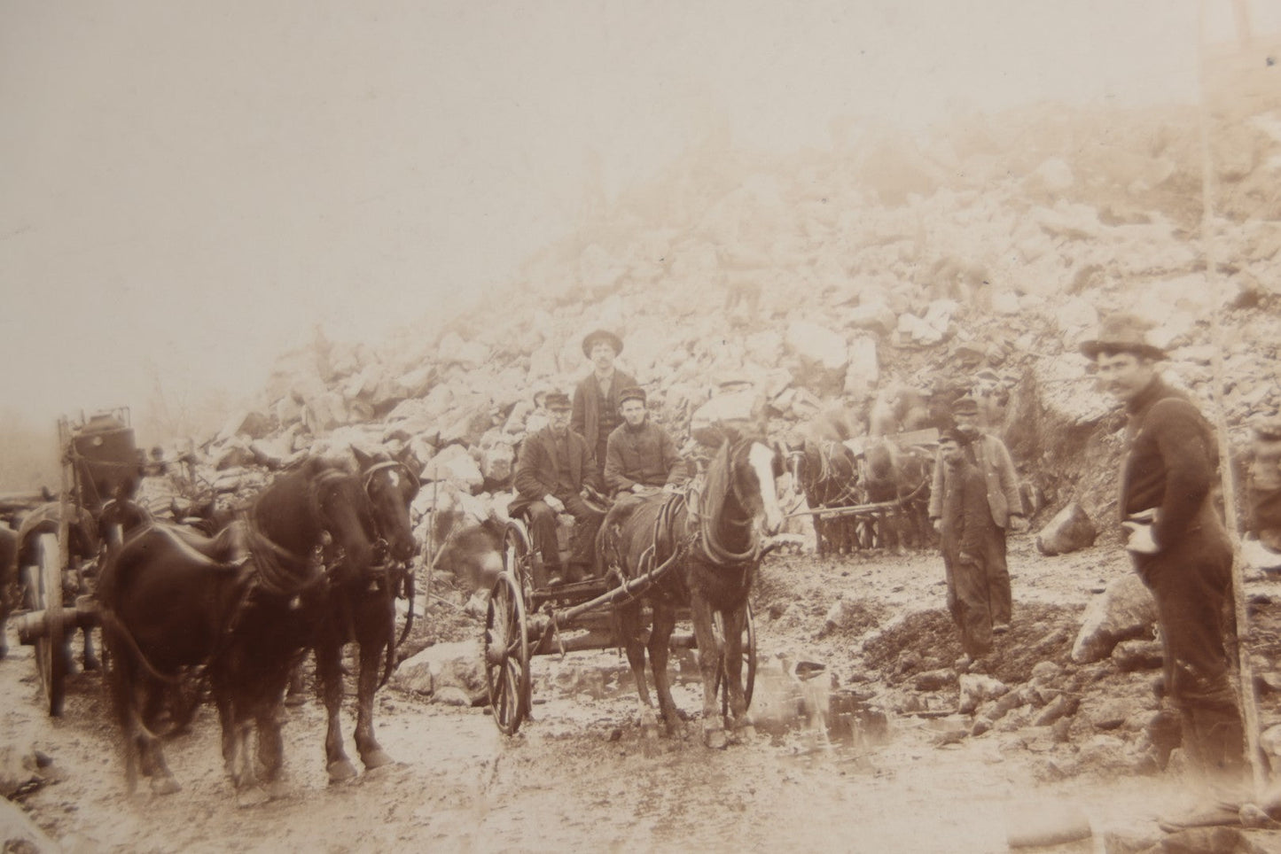 Lot 128 - Antique Boarded Occupational Photograph Of Loggers At Work, Many Horses In Frame