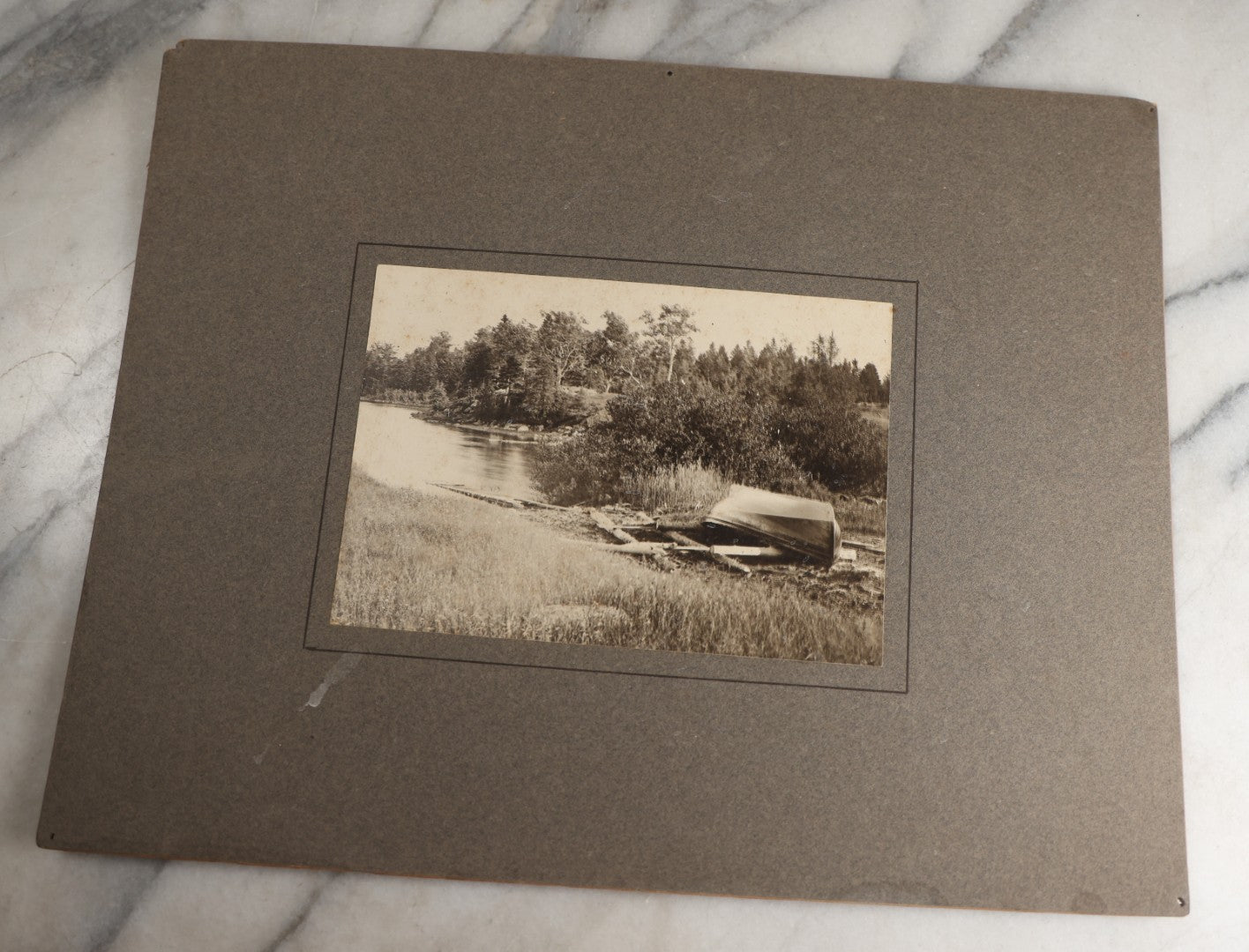 Lot 131 - Pair Of Antique Boarded Photographs Of Outdoor Scenes, Including Boy And Girl On Primitive Stick Bridge Crossing Creek, Canoe