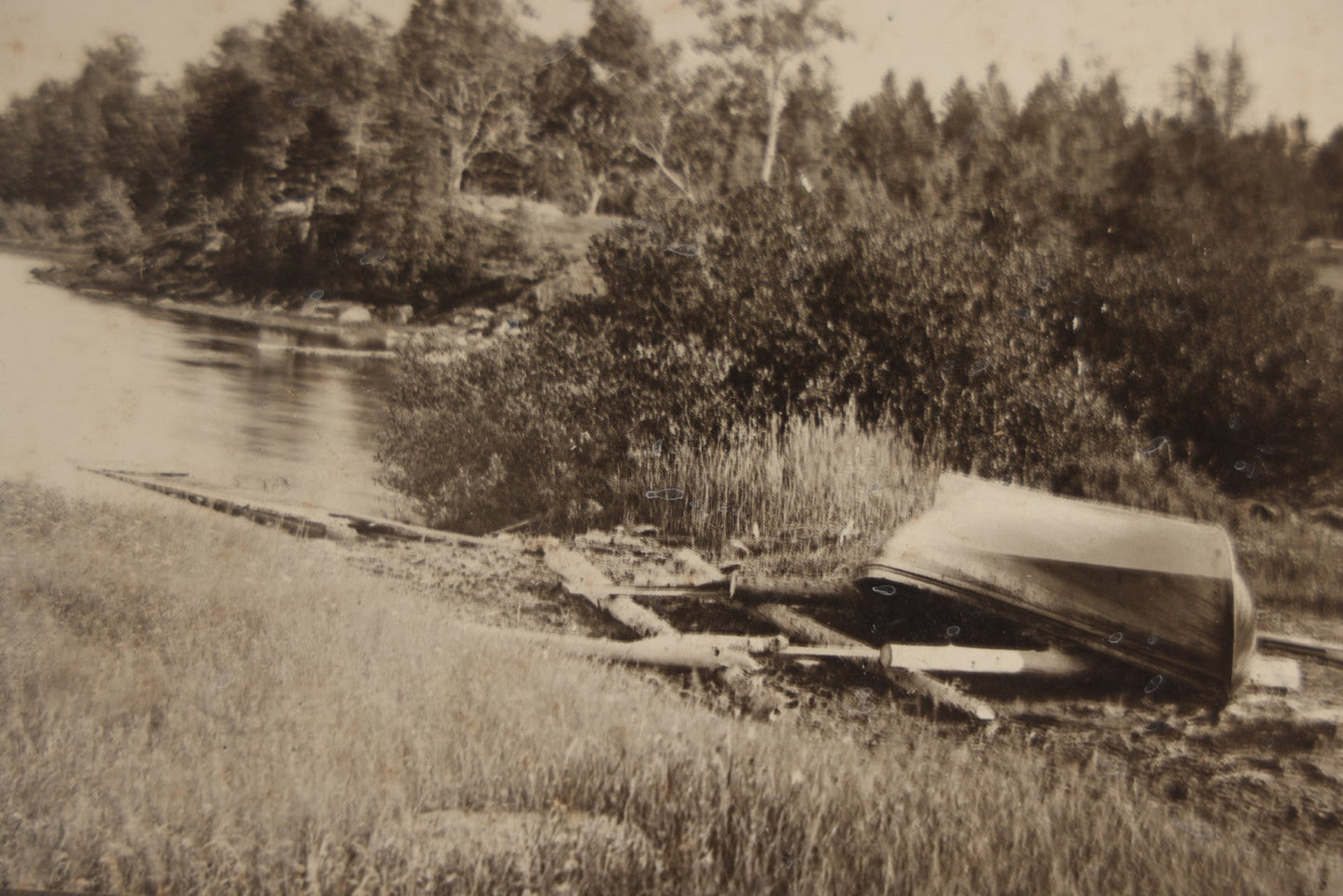 Lot 131 - Pair Of Antique Boarded Photographs Of Outdoor Scenes, Including Boy And Girl On Primitive Stick Bridge Crossing Creek, Canoe