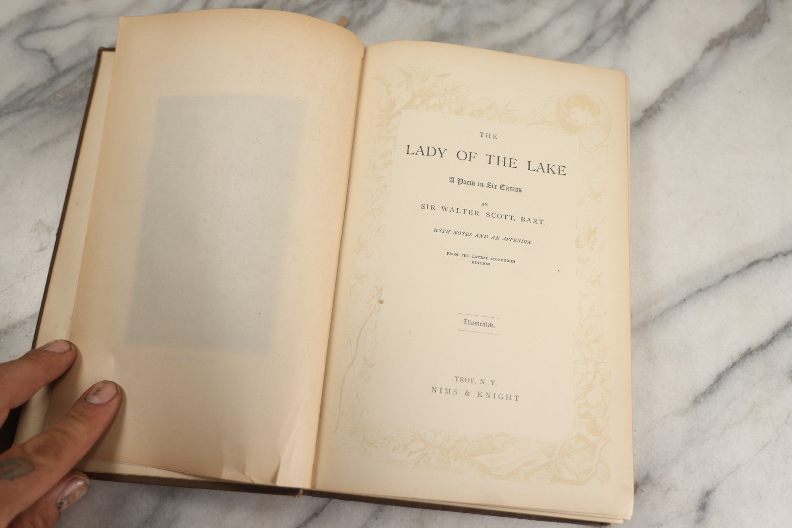 Lot 134 - "The Lady Of The Lake" Antique Poetry Book By Sir Walter Scott, Illustrated, Decorative Brown Cloth Boards With Red And Black Floral And Scroll Design, Gilt Title Panel, Nims & Knight, Publishers, Troy, N.Y., 1884