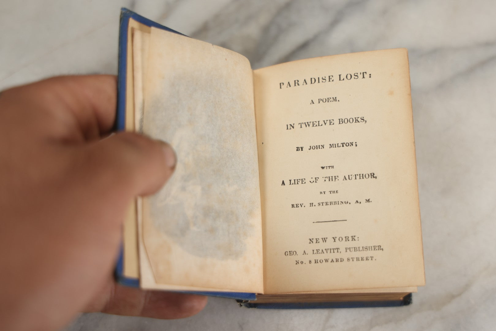 Lot 135 - "Paradise Lost" Antique Miniature Book By John Milton, With A Life Of The Author By Rev. H. Stebbing, Engraved Frontispiece, Decorative Blue Cloth Boards With Gilt "Milton" Cartouche And Shield, Geo. A. Leavitt, Publisher, New York, Circa 1860s