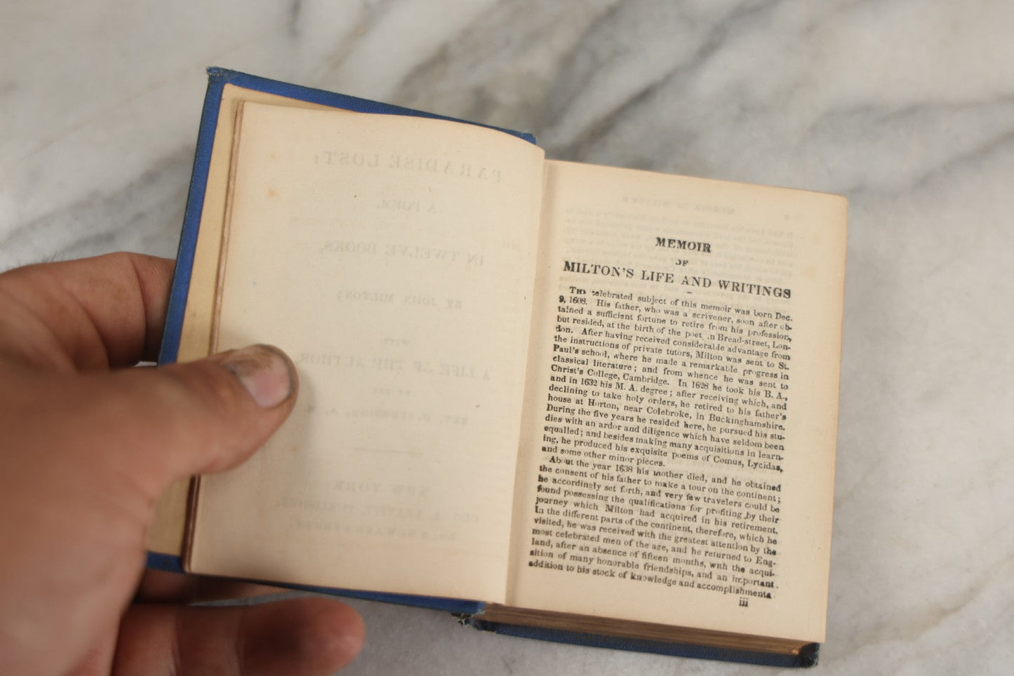 Lot 135 - "Paradise Lost" Antique Miniature Book By John Milton, With A Life Of The Author By Rev. H. Stebbing, Engraved Frontispiece, Decorative Blue Cloth Boards With Gilt "Milton" Cartouche And Shield, Geo. A. Leavitt, Publisher, New York, Circa 1860s