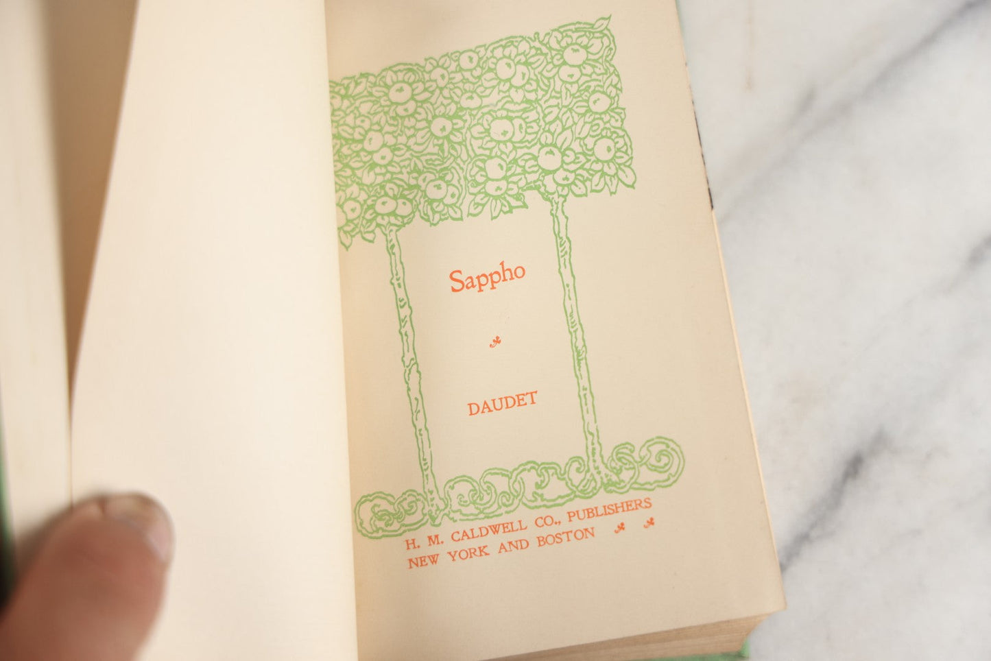 Lot 150 - "Sappho" Antique Book By Alphonse Daudet, Illustrated H.M. Caldwell Co., Publishers, New York And Boston, Circa 1900, Note Cover Board Warped 