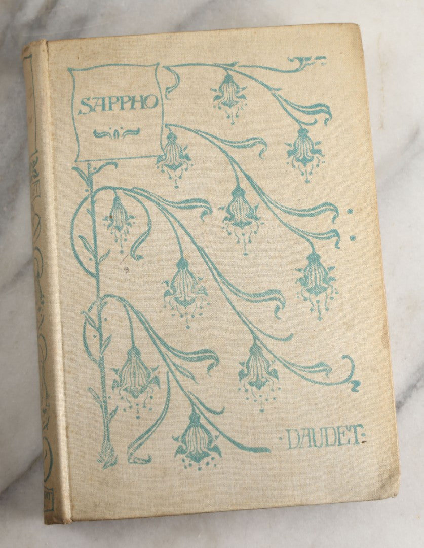 Lot 151 - "Sappho" Antique Book By Alphonse Daudet, Illustrated By Rossi, Myrbach, Etc., Translated By Henry Frith, Gilded Fore-Edge, J.M. Dent And Co., Publishers, London, , Circa 1895, Note Cover Board Warped, Heavy Foxing