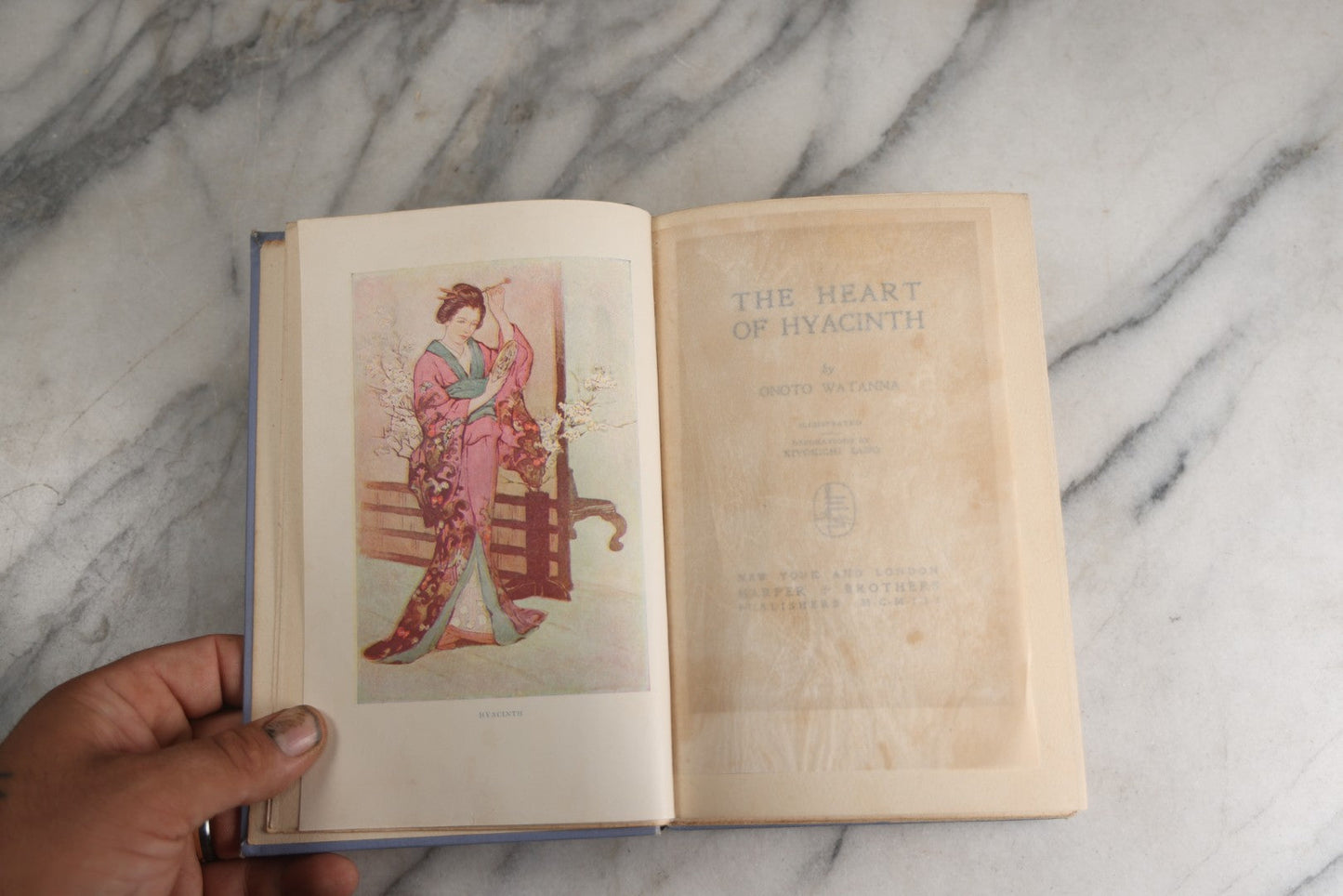 Lot 159 - "The Heart Of Hyacinth" Antique Book By Onoto Watanna, Illustrated With Decorations By Kokichi Sano, Light Blue Cloth Boards With White And Green Floral Design And Gilt Titles, Harper & Brothers, Publishers, New York And London, 1903